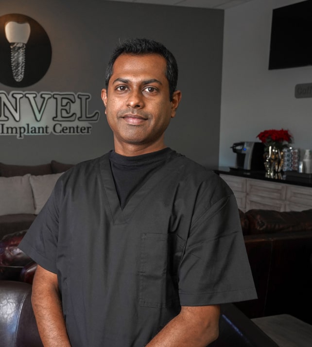 Dental assistant smiling in dental office